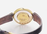 An 18K Yellow Gold Happy Diamonds Ladies Watch by Chopard