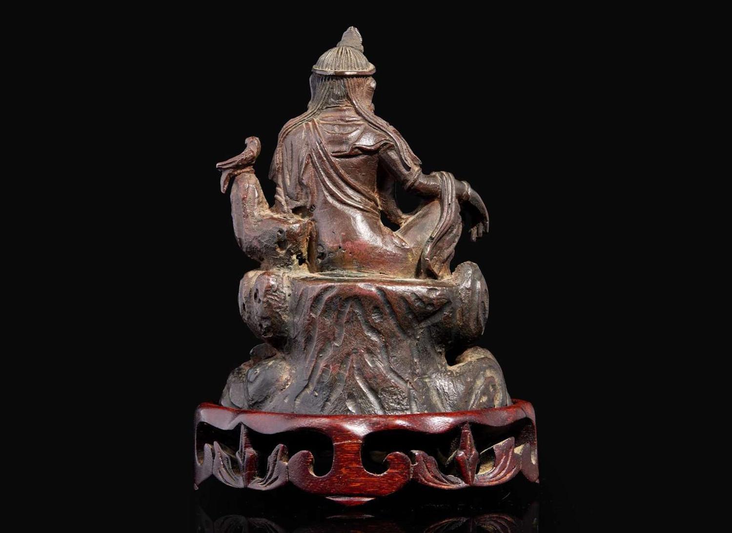 A small patinated bronze figure of "Water-Moon" Guanyin, 17th/18th century or earlier 銅加漆水月觀音像 十七至十八世紀或更早