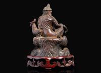 A small patinated bronze figure of "Water-Moon" Guanyin, 17th/18th century or earlier 銅加漆水月觀音像 十七至十八世紀或更早