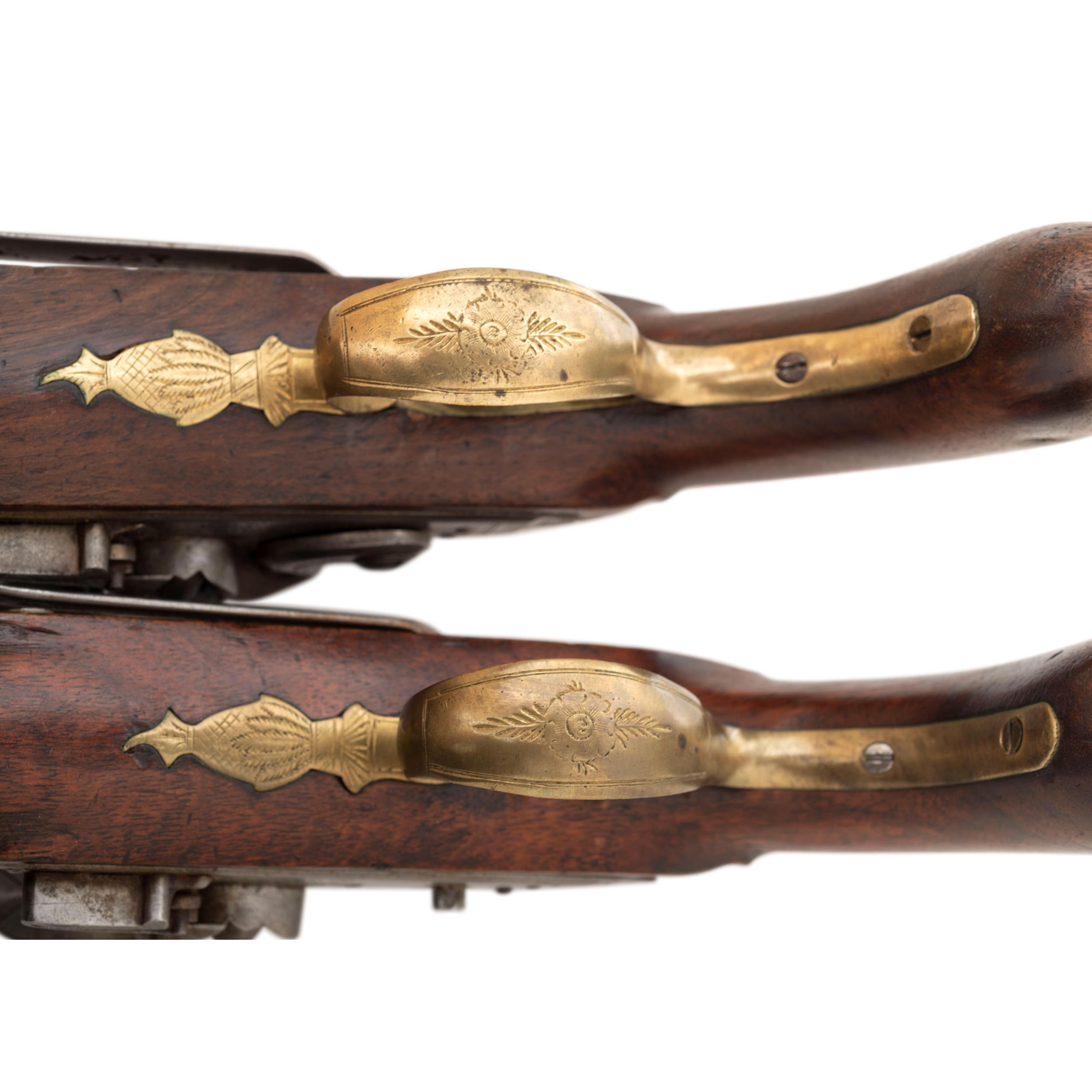 Pair of British Flintlock Pistols with Belt Hooks by Hampton