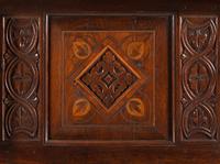 A Jacobean Carved Oak and Marquetry Court Cupboard