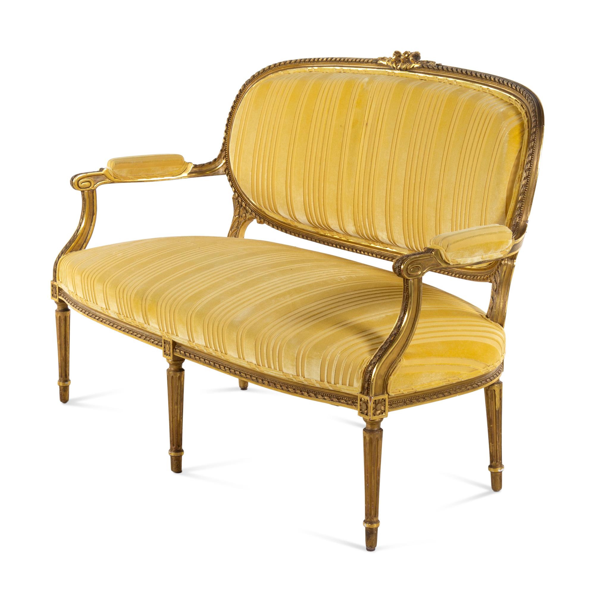 A Louis XVI Style Carved Giltwood Sofa