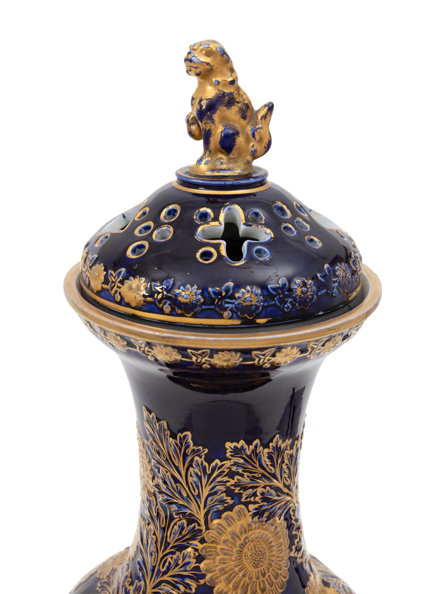 An English Cobalt Glazed and Gilt Decorated Earthenware Potpourri Vase