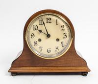 An American Walnut Mantel Clock Height 9 3/8 x width 11 1/2 inches. — 20TH CENTURY