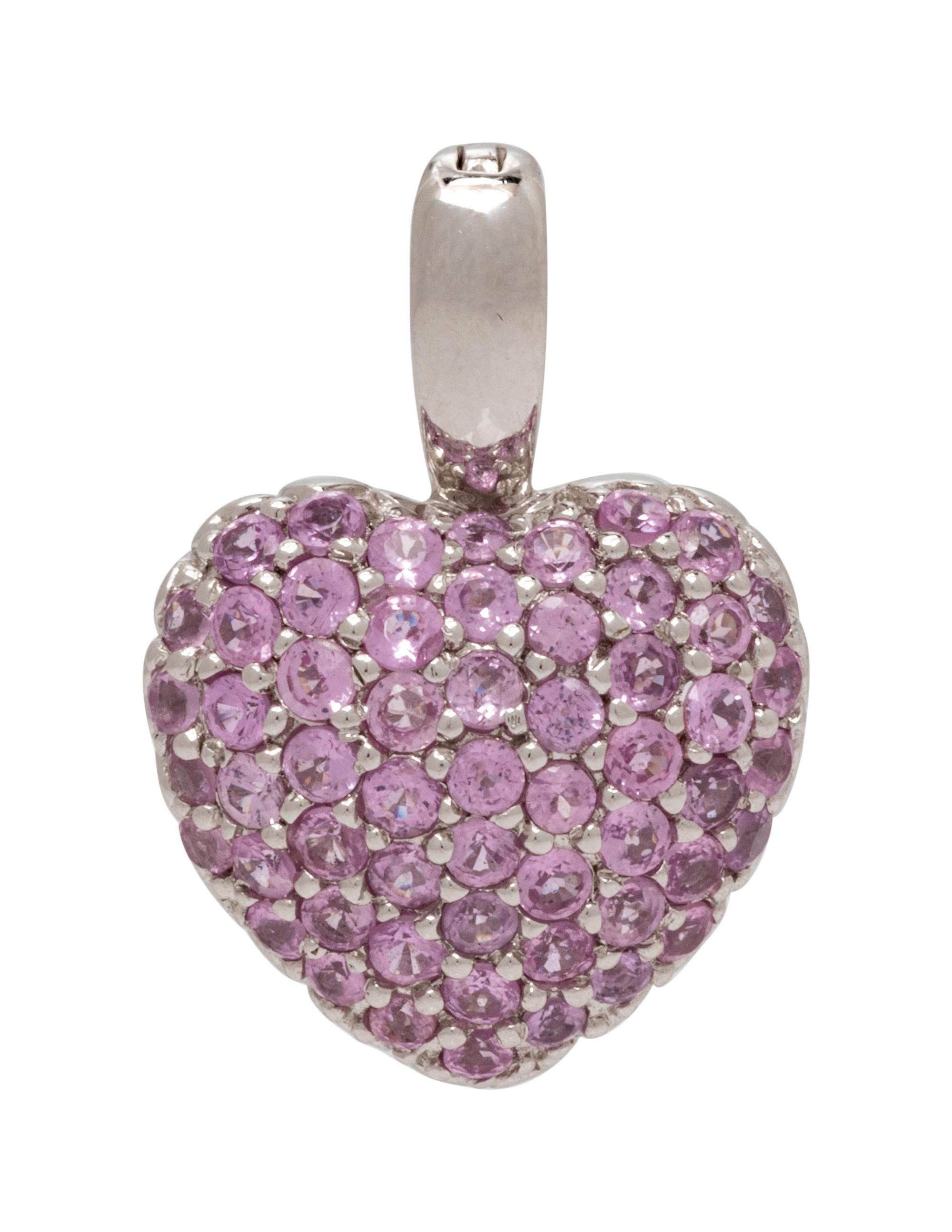 A 14 Karat White Gold and Pink Sapphire Heart Pendant,
