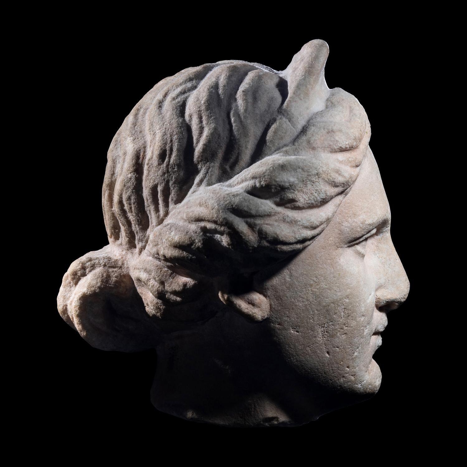 A Roman Marble Head of a Goddess