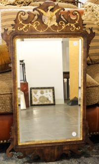 A Chippendale Style Parcel Gilt Mahogany Mirror Height 40 1/2 x width 22 1/2 inches. — 19TH CENTURY