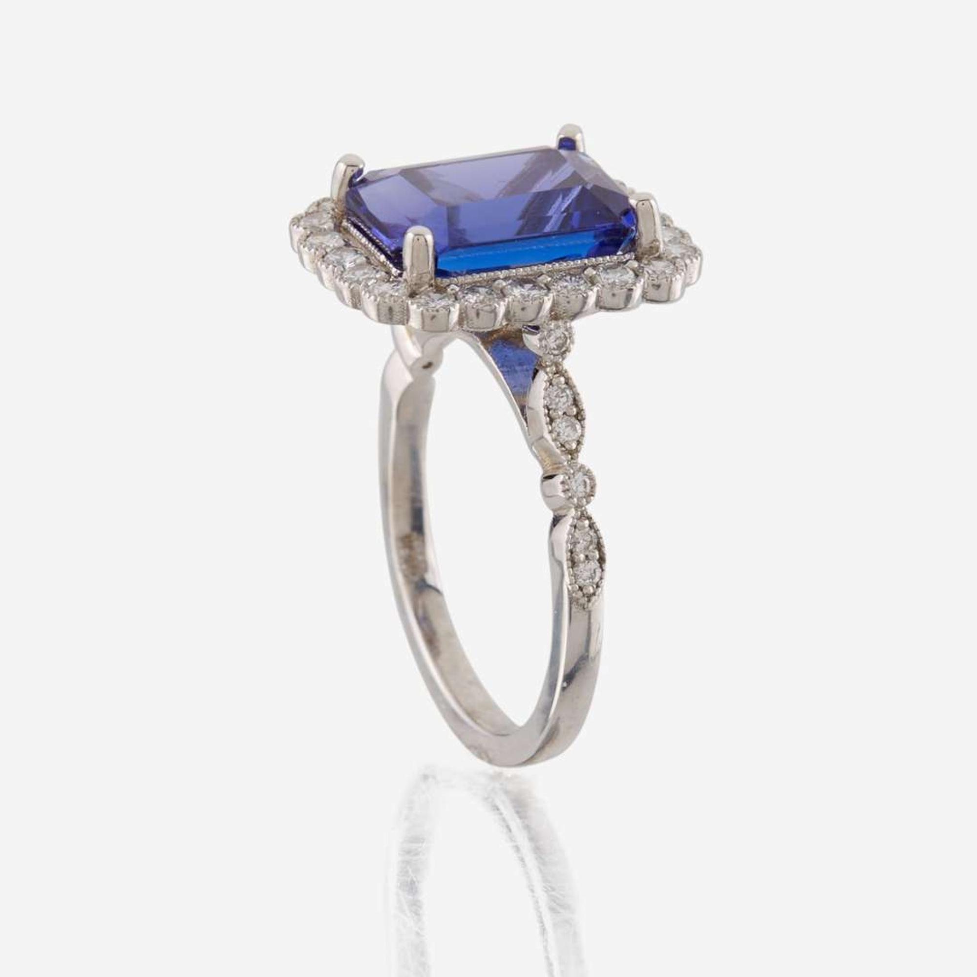 A tanzanite, diamond, and white gold ring