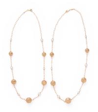 PAIR OF YELLOW GOLD AND CULTURED PEARL NECKLACES