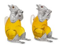 A Pair of Silver-Plate and Yellow Glass Squirrel Decanters
