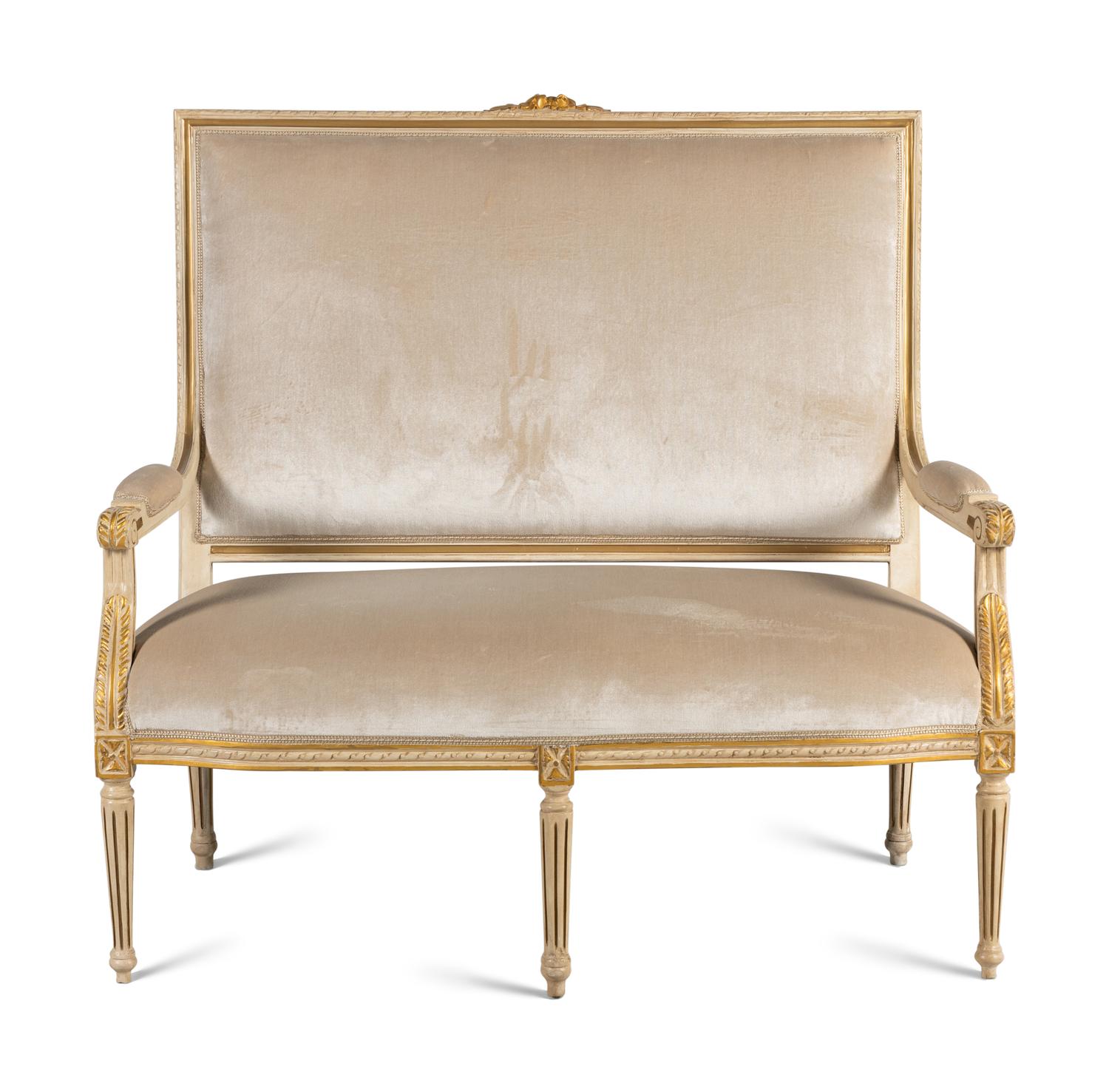 A Louis XVI Style Painted and Parcel Gilt Settee