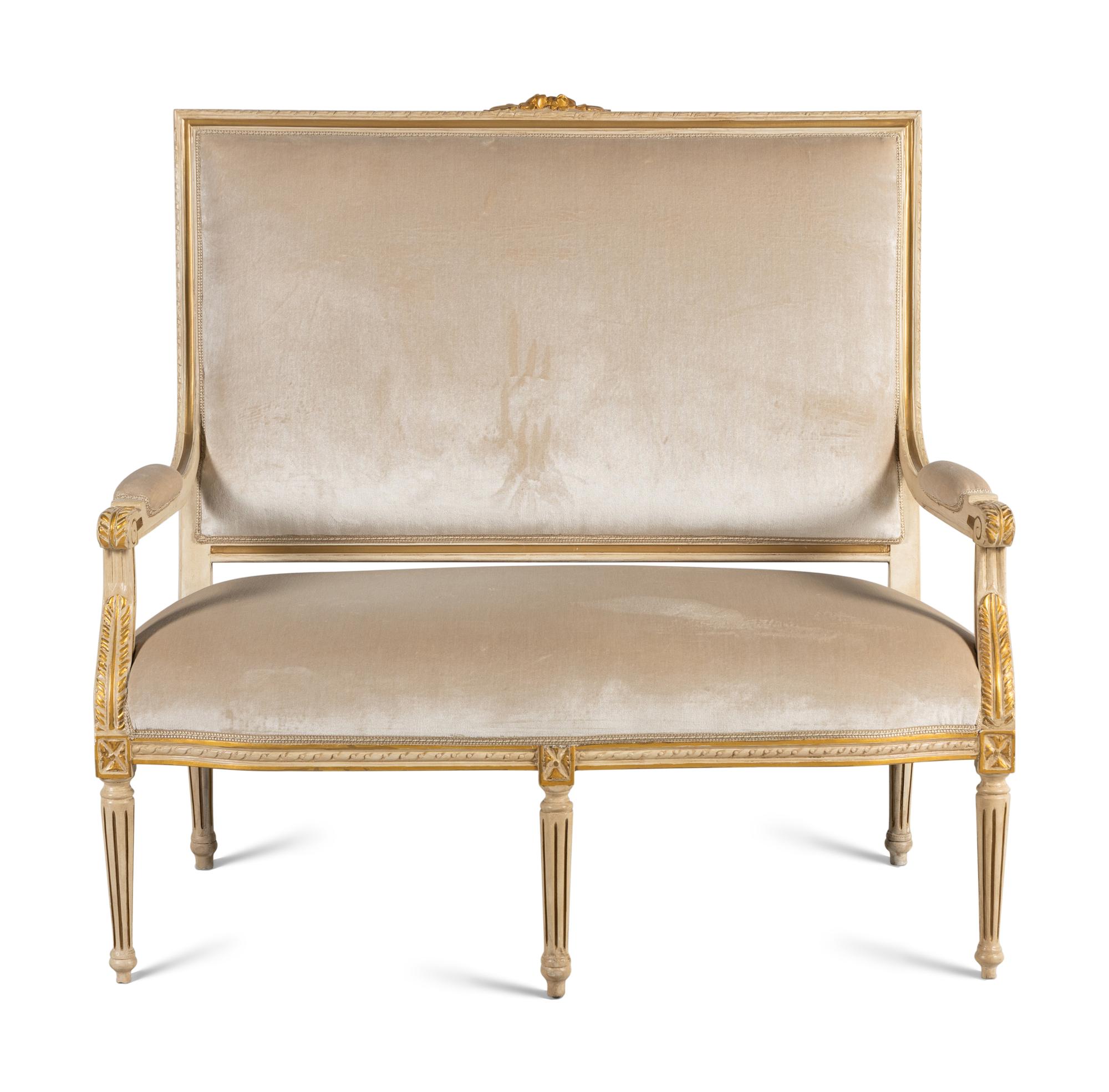 A Louis XVI Style Painted and Parcel Gilt Settee