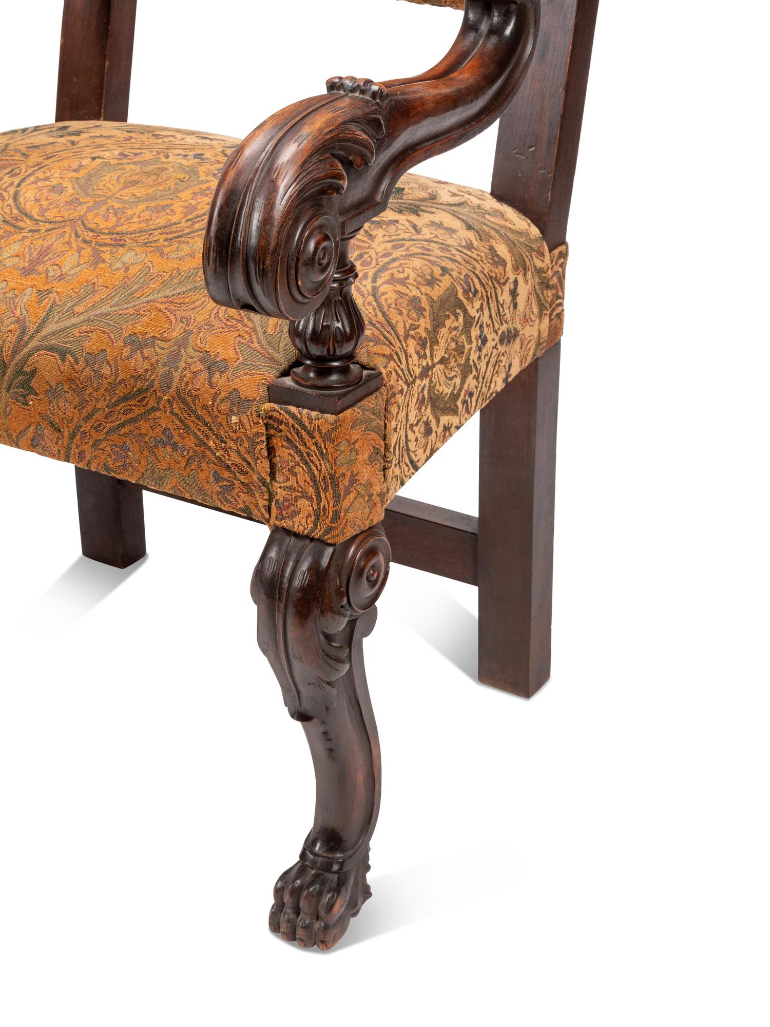 A Pair of Flemish Baroque Style Carved Walnut Armchairs