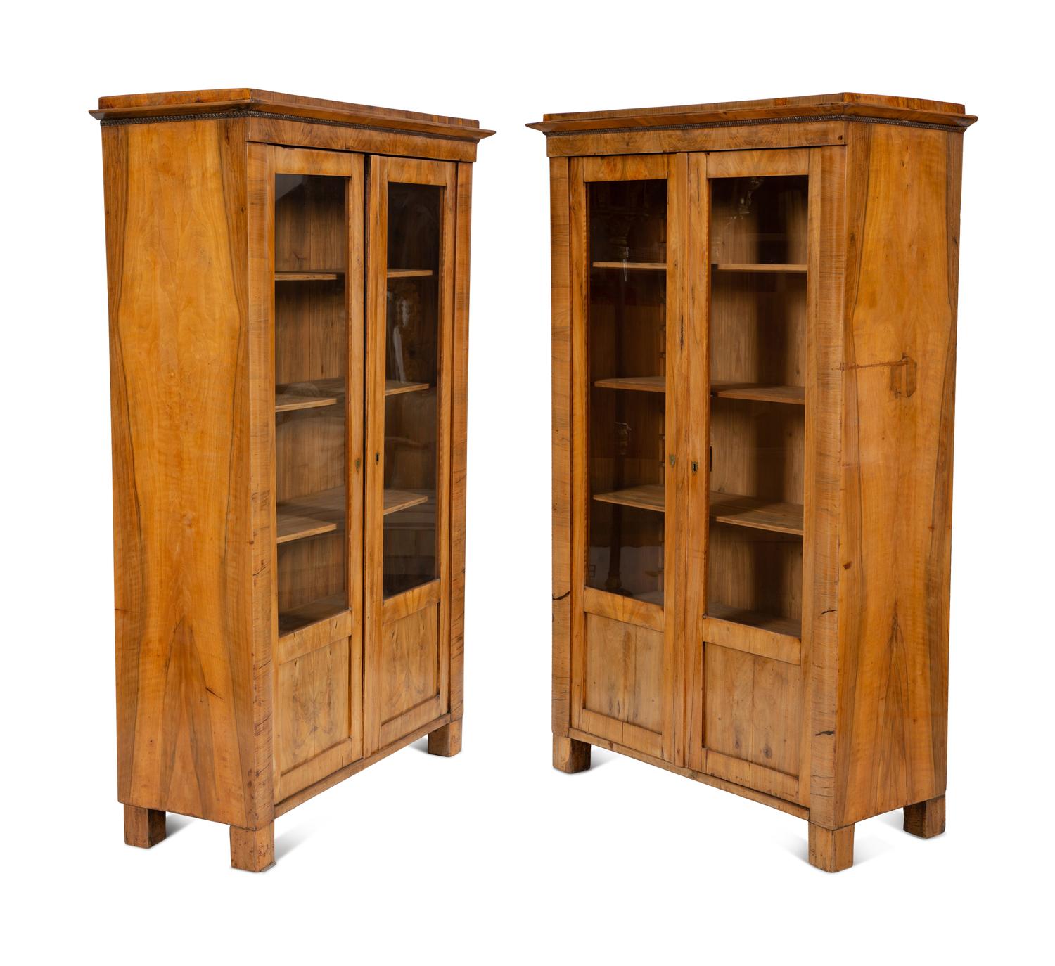 A Pair of Biedermeier Figured Birch Bookcases