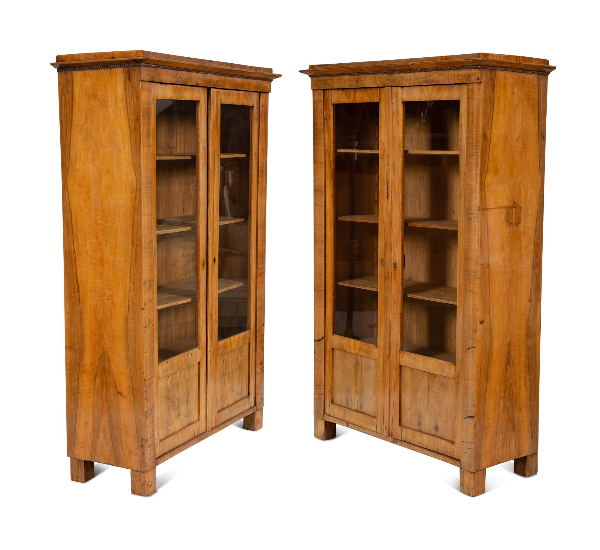 A Pair of Biedermeier Figured Birch Bookcases
