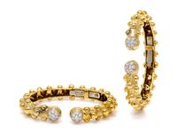 A Pair of 18 Karat Yellow Gold, Platinum and Diamond Bangle Bracelets, David Webb, 26.20 dwts.