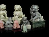 11 Chinese Figures of Seated Fu- Lions