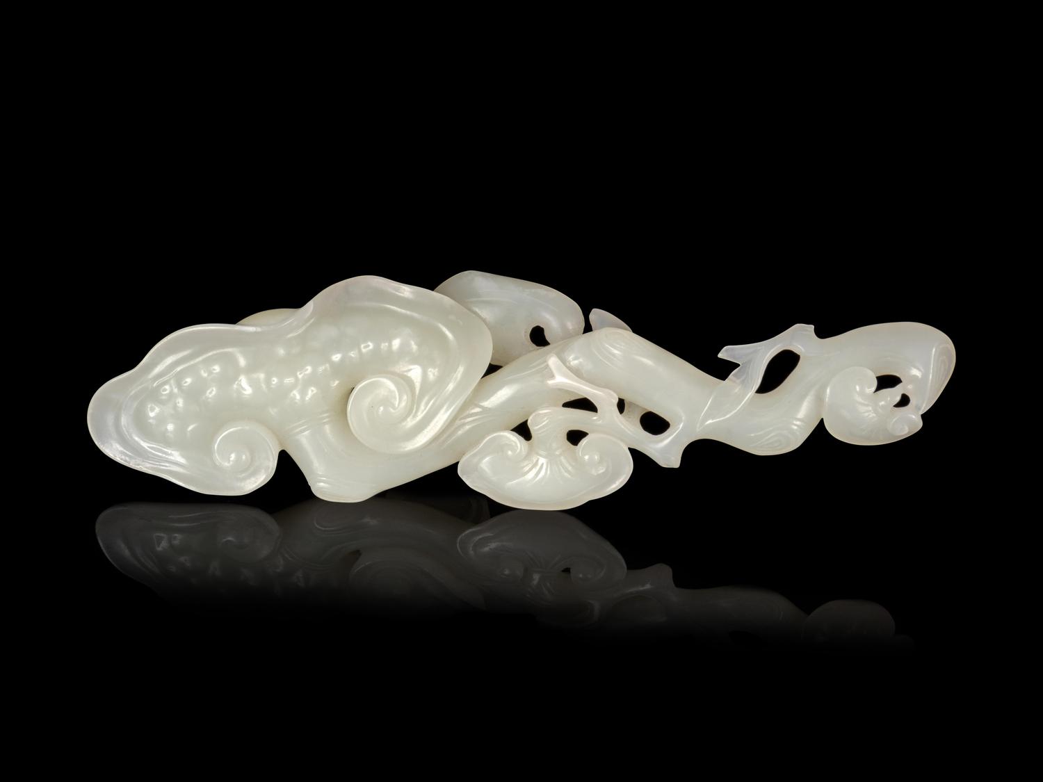 A Carved White Jade 'Lingzhi' Ruyi Scepter
