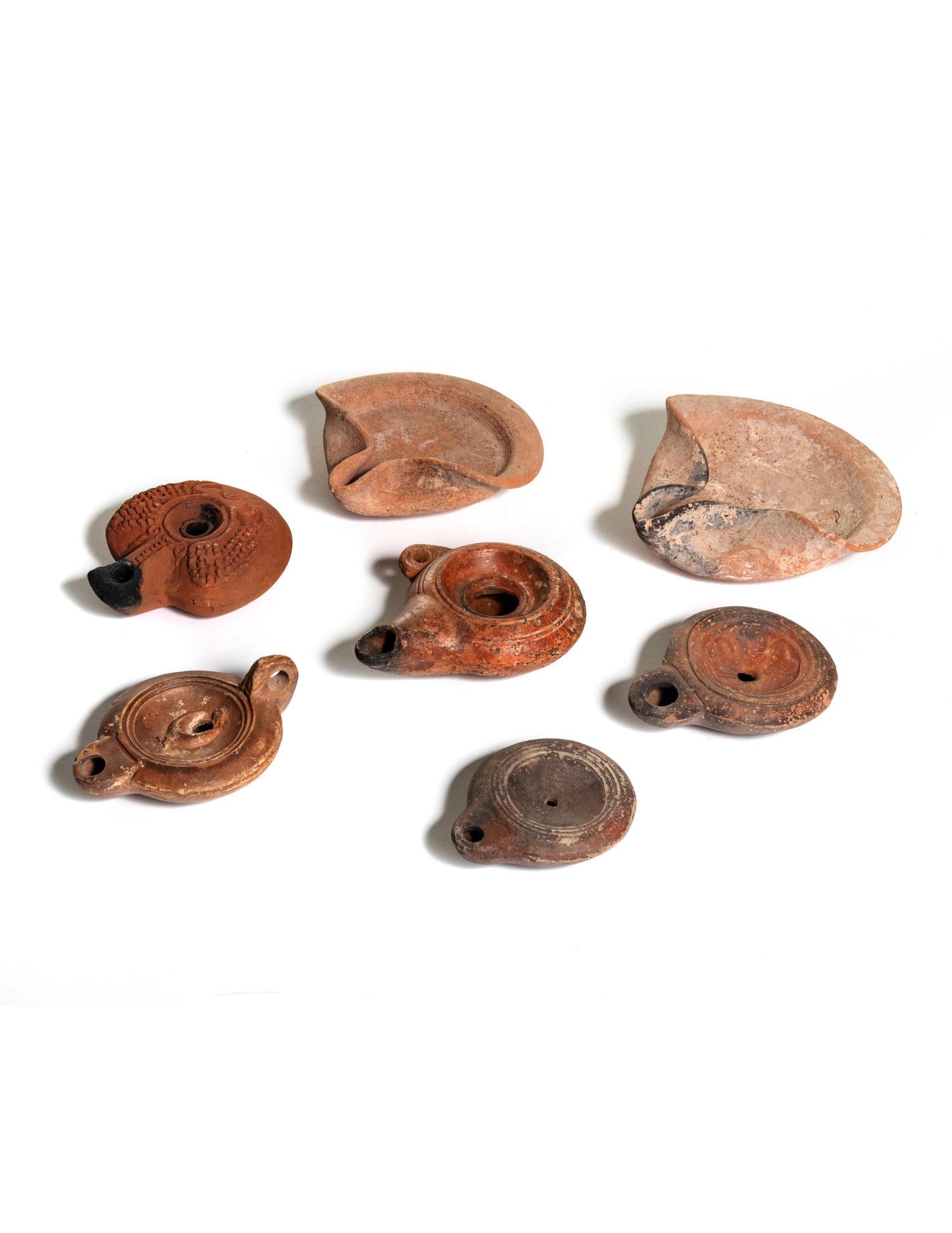 Five Roman Molded Terra Cotta Oil Lamps