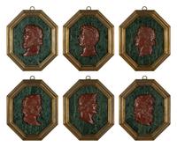 A Set of Six Continental Marble and Faux Porphyry Profile Medallions of Roman Emperors