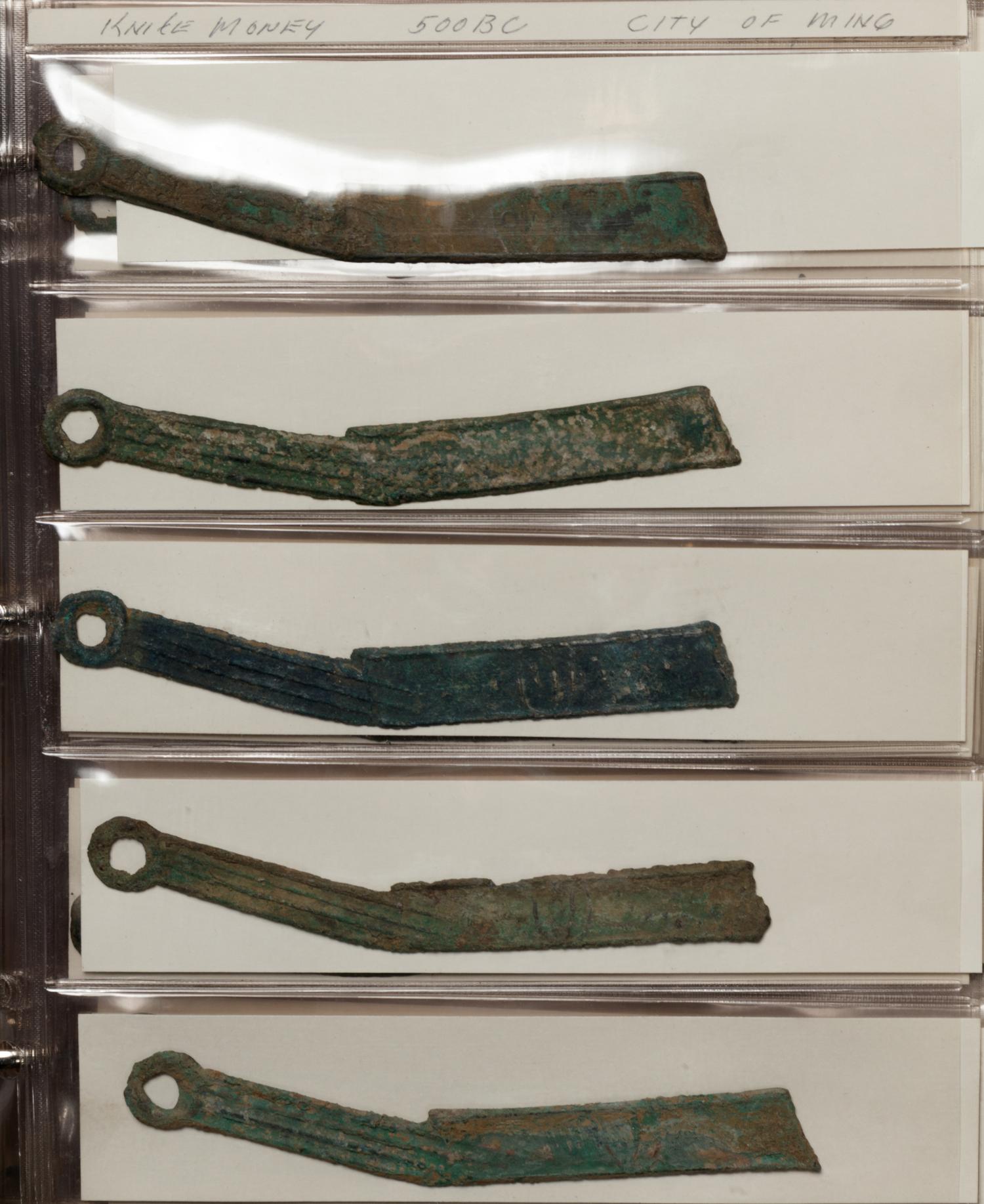 A Large Collection of Chinese Coins and Pendants