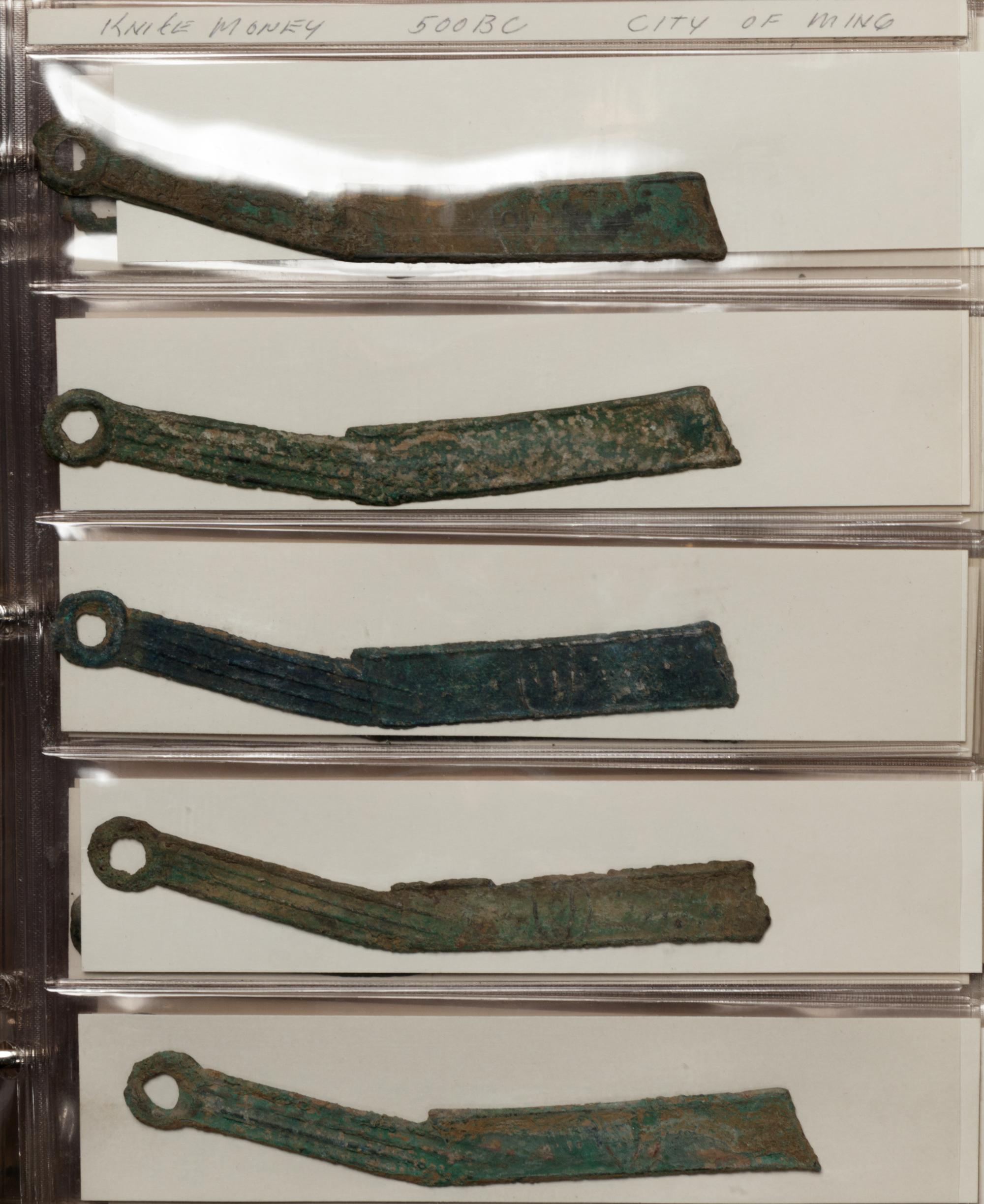 A Large Collection of Chinese Coins and Pendants