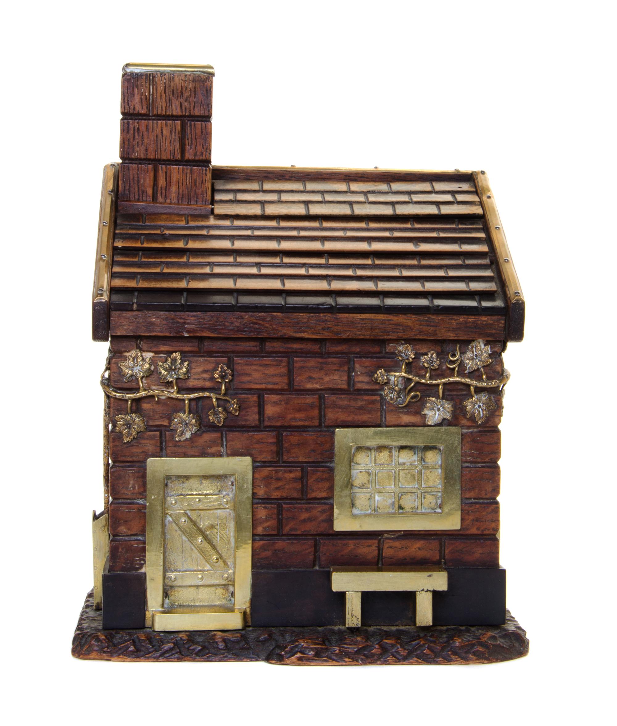 An English Gilt Metal Mounted Oak Humidor Height 10 1/2 x width 8 x depth 5 1/2 inches. — 20TH CENTURY
