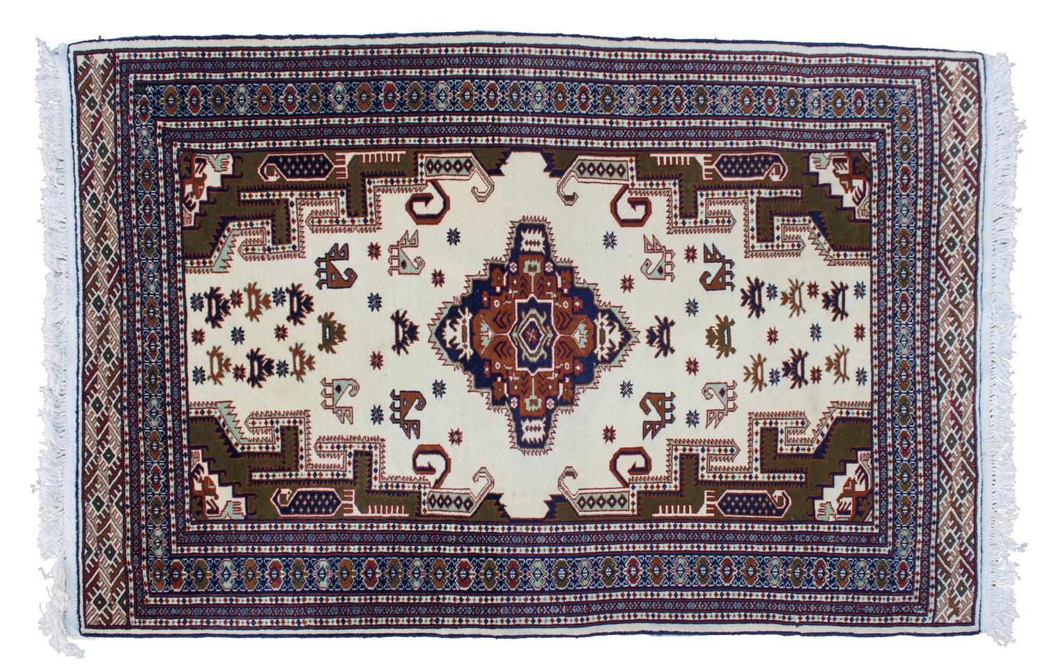 An Iranian Wool Rug 7 feet x 4 feet 6 1/2 inches.