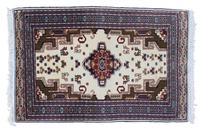 An Iranian Wool Rug 7 feet x 4 feet 6 1/2 inches.