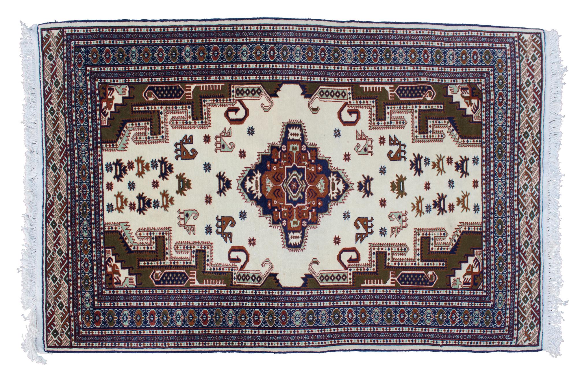 An Iranian Wool Rug 7 feet x 4 feet 6 1/2 inches.