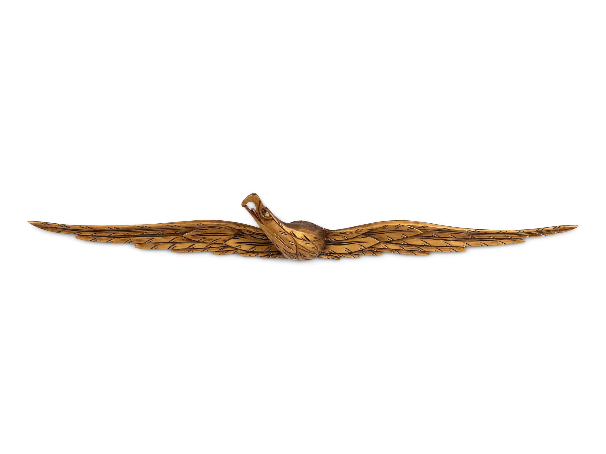 A Carved and Gold-Painted Wood Eagle