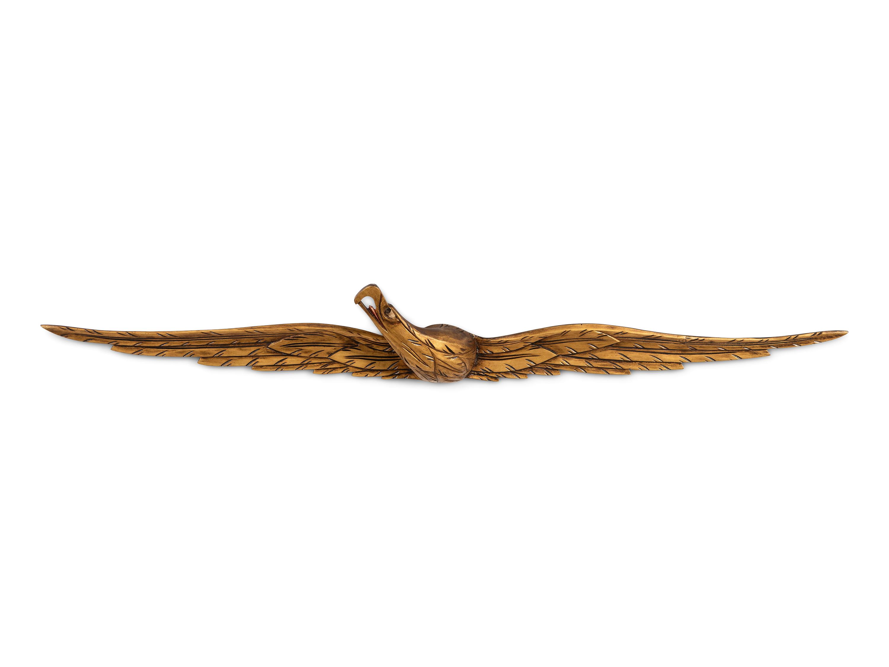 A Carved and Gold-Painted Wood Eagle