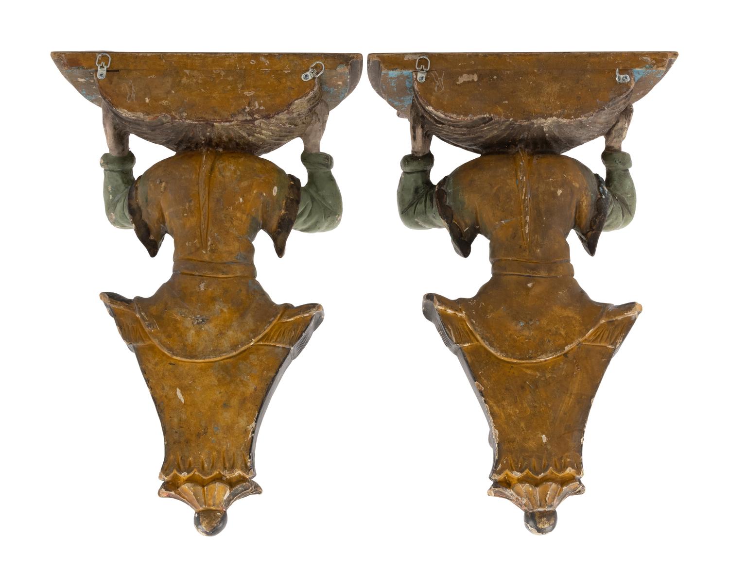 A Pair of Italian Carved and Polychrome Decorated Wood Figural Wall Brackets