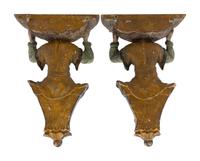 A Pair of Italian Carved and Polychrome Decorated Wood Figural Wall Brackets