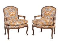 A Pair of Louis XV Style Oak Fauteuils