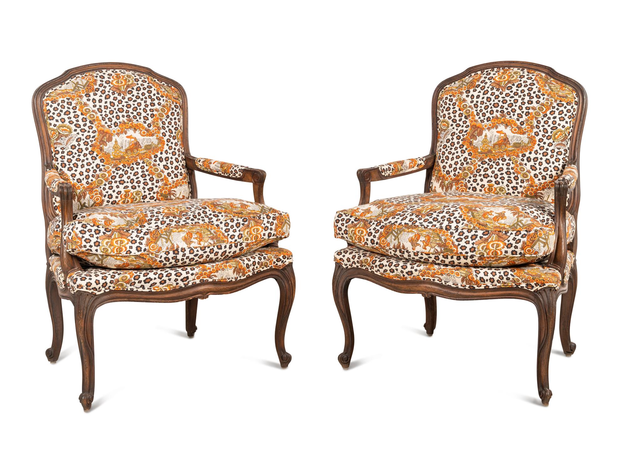 A Pair of Louis XV Style Oak Fauteuils