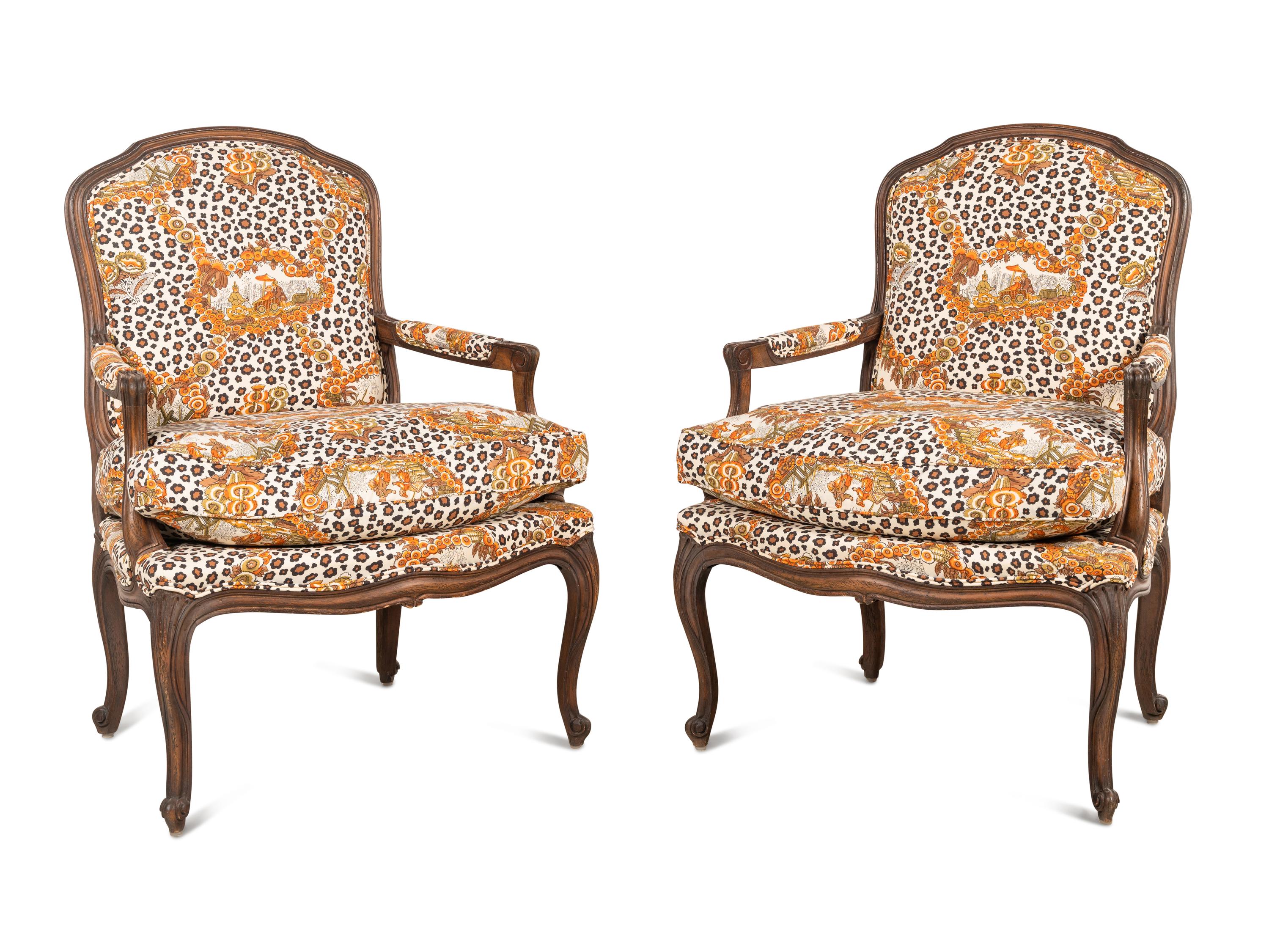 A Pair of Louis XV Style Oak Fauteuils