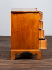 A Chippendale Style Tiger Maple Serpentine Chest of Drawers