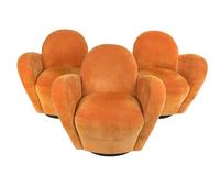 A Set of Three Corduroy Upholstered Swivel Lounge Chairs — 20TH CENTURY