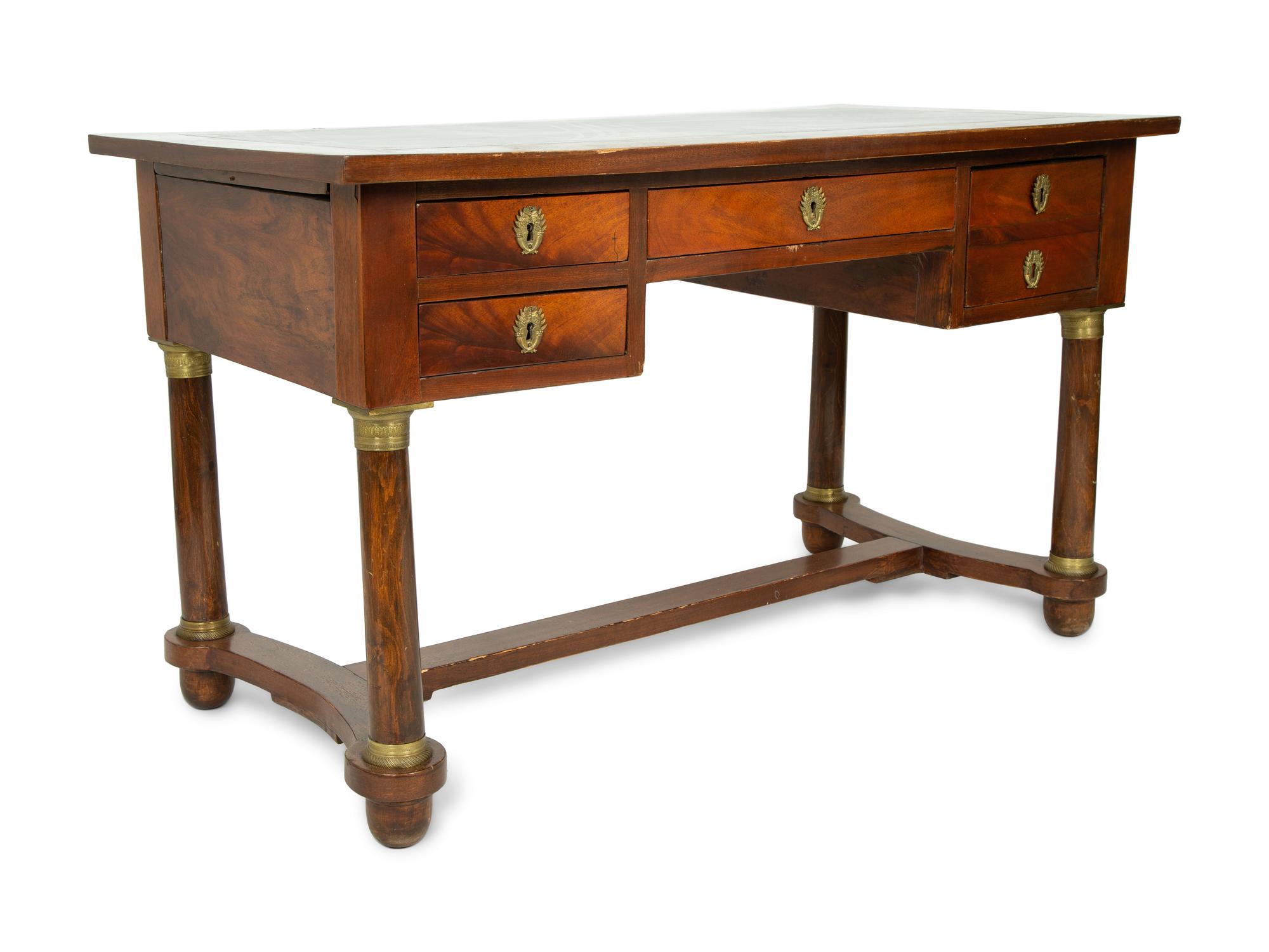 A Louis Philippe Gilt Bronze Mounted Walnut Desk — 19TH CENTURY