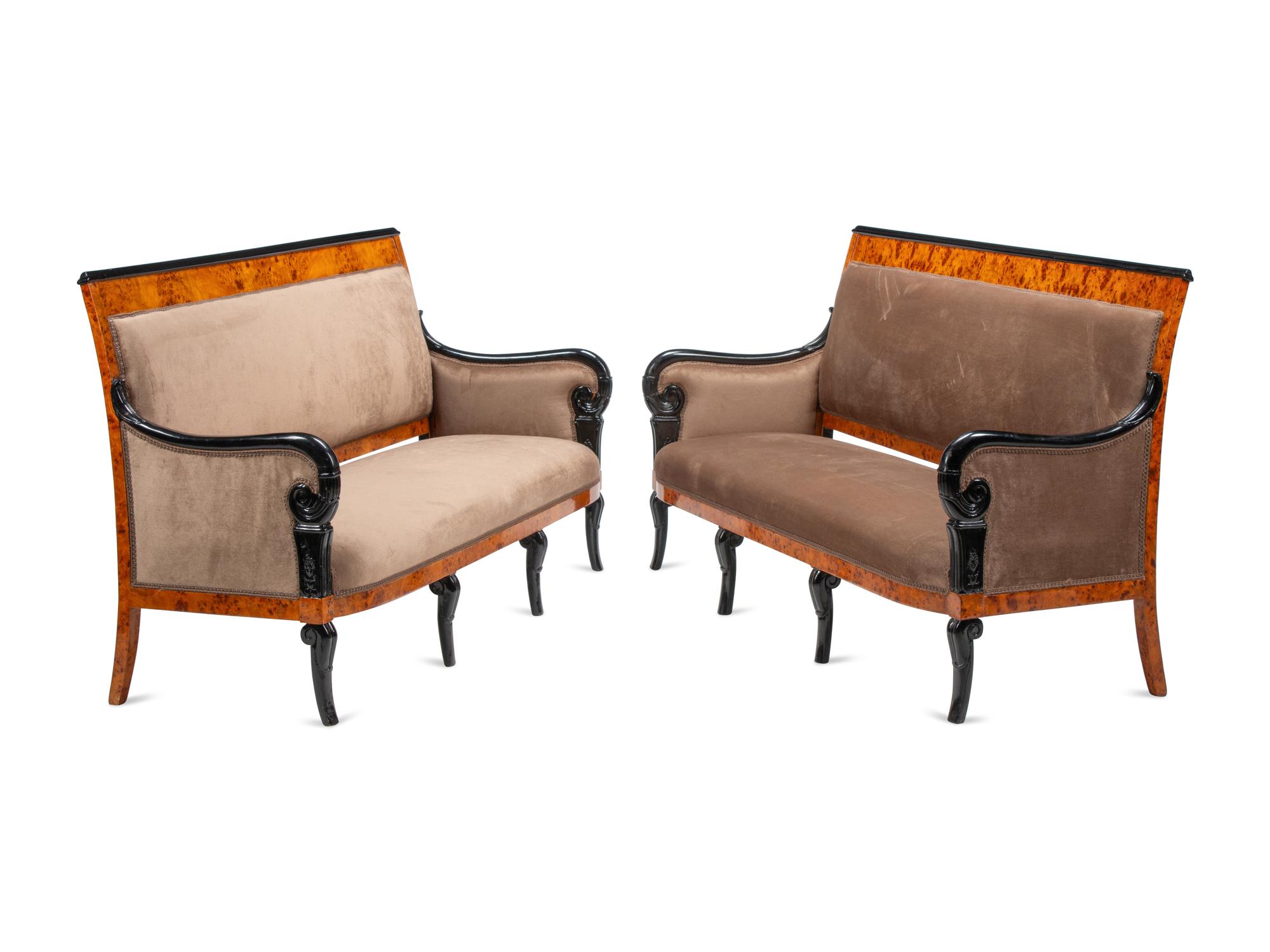 A Pair of Louis Philippe Style Part Ebonized Burlwood Settees