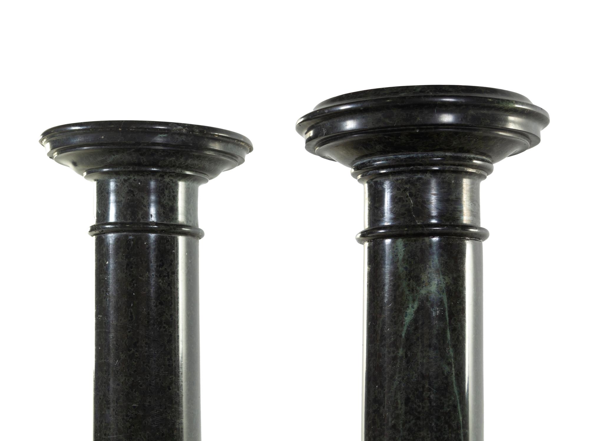 A Pair of Neoclassical Carved Verde Antico Marble Pedestals