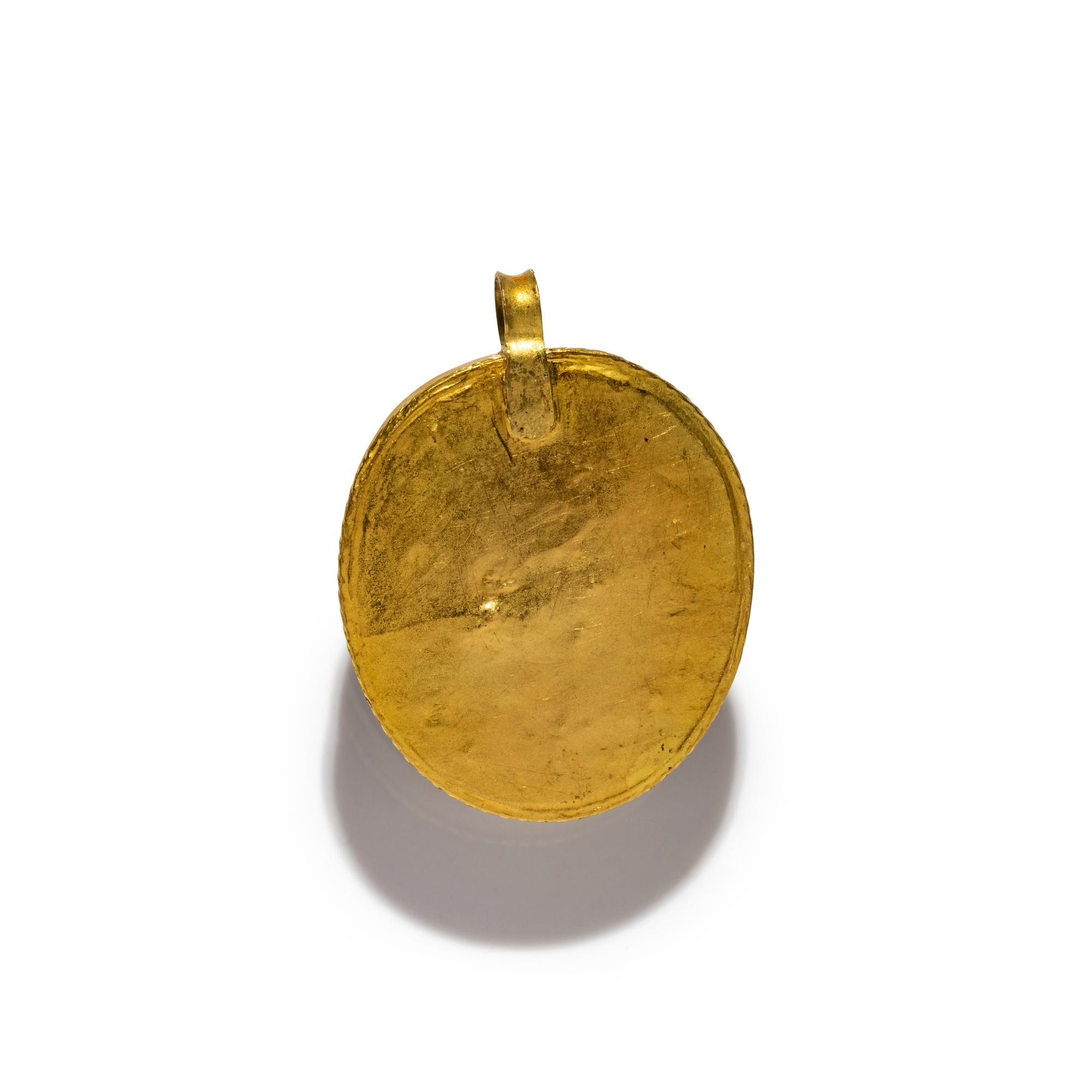 A Roman Amethyst Cameo with the Head of Medusa — Set in a gold pendant