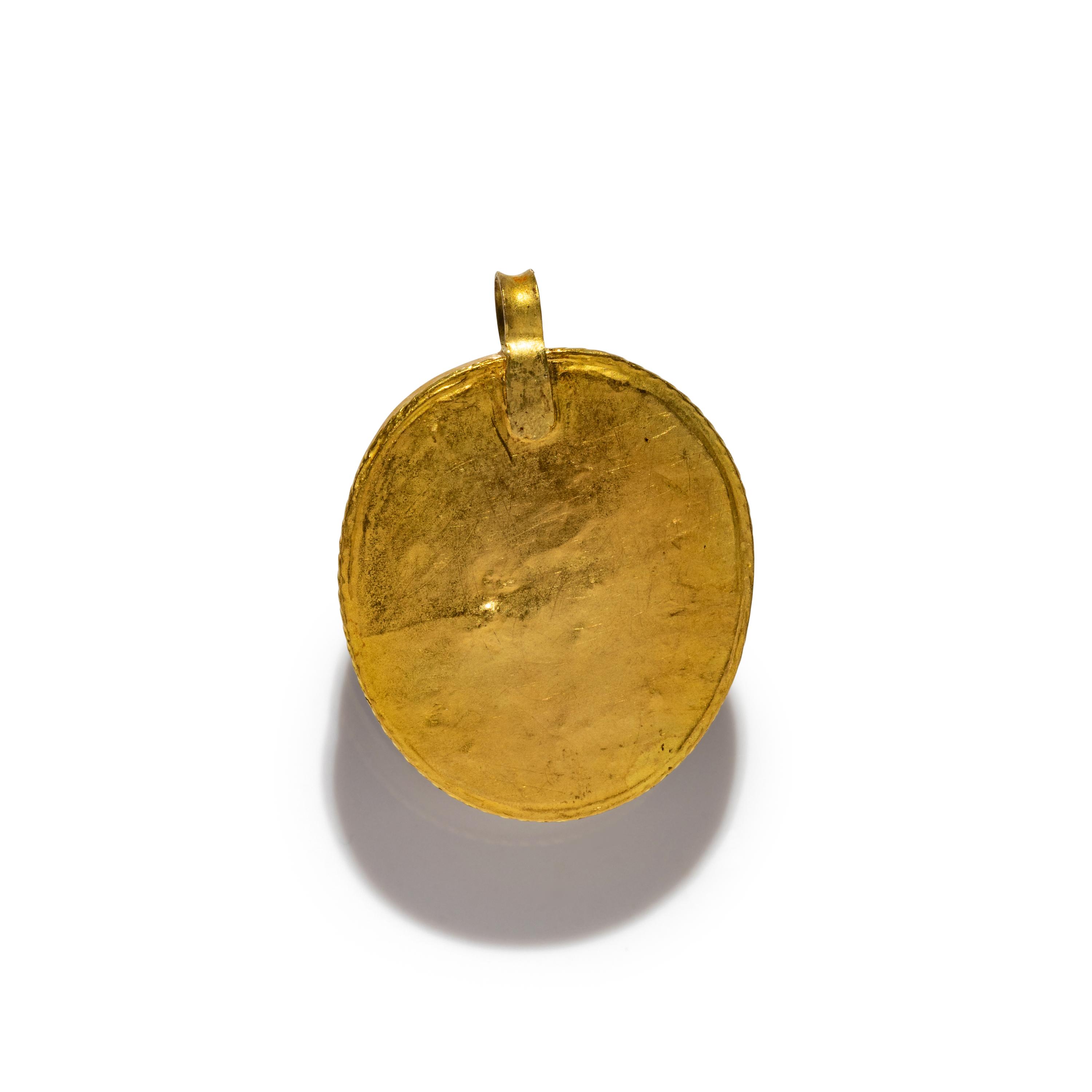 A Roman Amethyst Cameo with the Head of Medusa — Set in a gold pendant