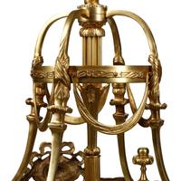 A Pair of Louis XVI Style Gilt Bronze and Mahogany Hall Lanterns
