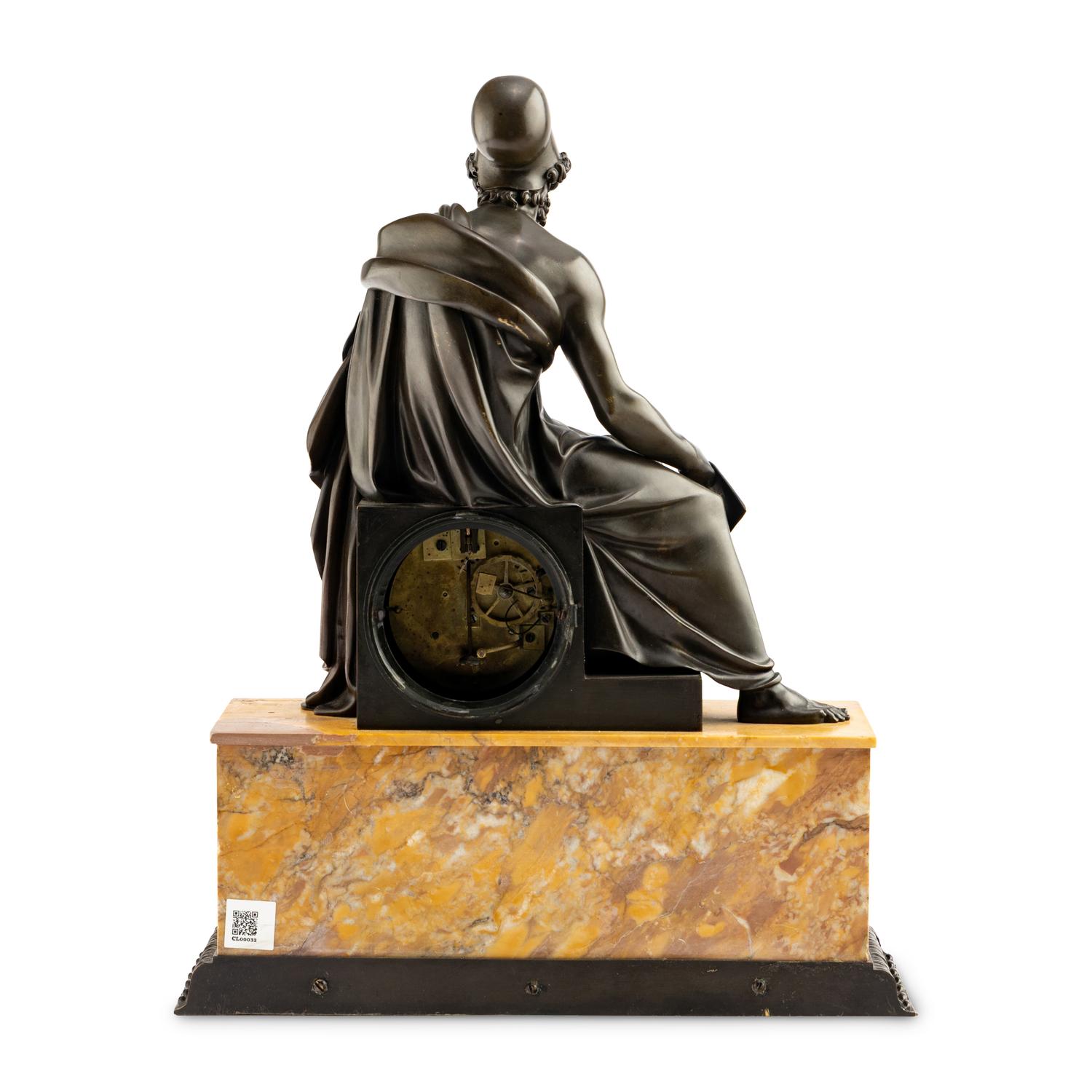 A Louis Philippe Patinated Bronze and Sienna Marble Figural Mantel Clock