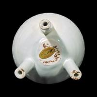 A Chinese Qingbai Style Molded Tripod Censor, Yuan Dynasty or Later 元或更晚 白釉如意紋瓷鼎