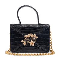 Two Emmelle Suits Accompanied by a Collection of Costume Jewelry and Caiman Handbag