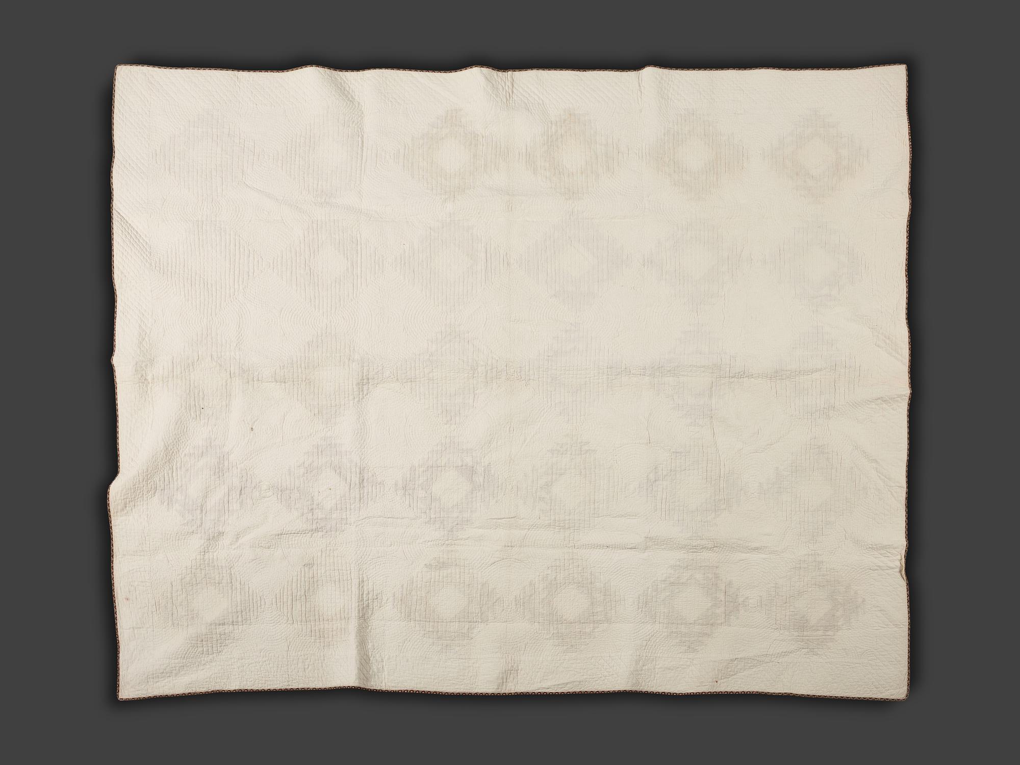 Three Patchwork Quilts