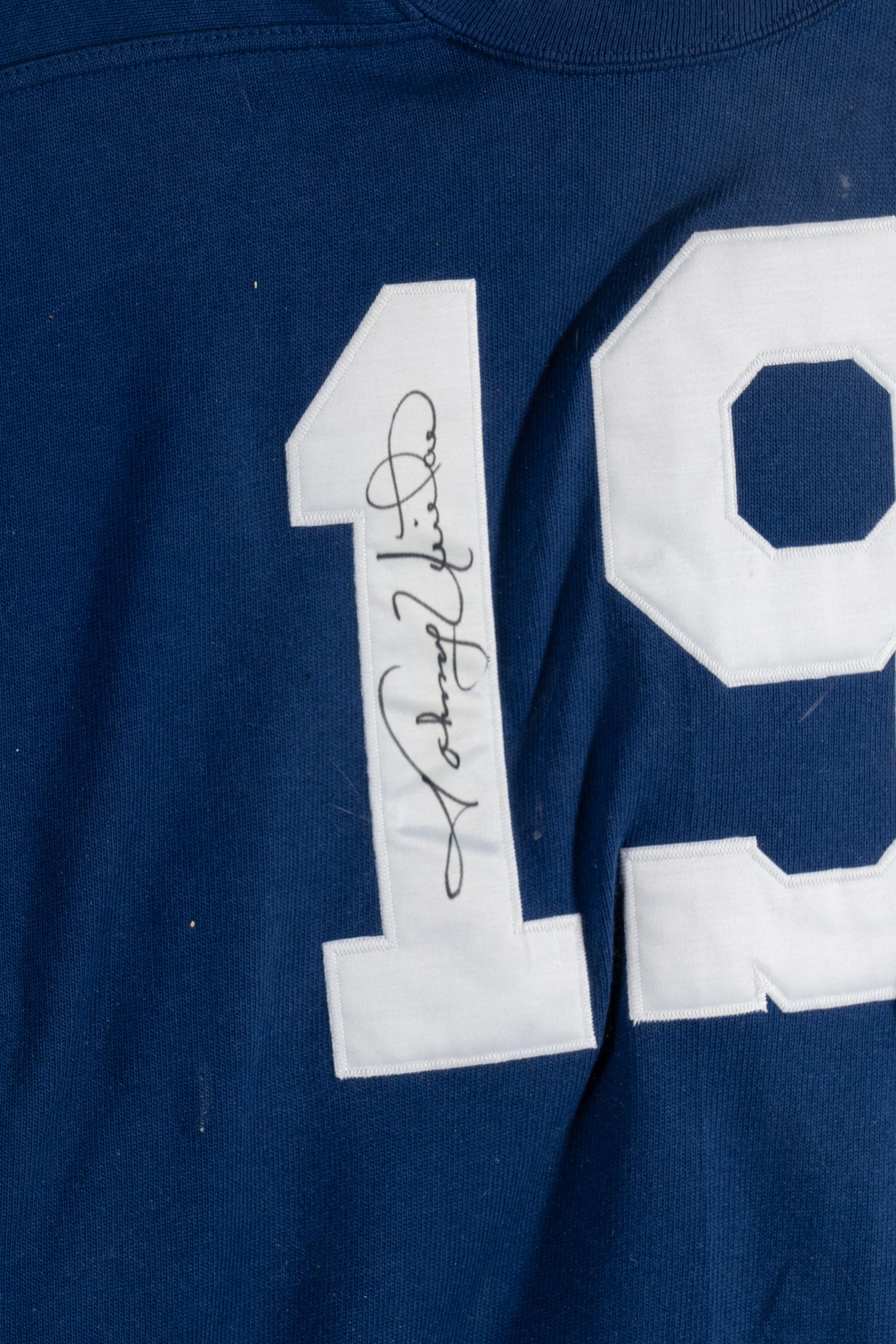 A Johnny Unitas Signed Autograph Baltimore Colts Jersey (With Photo From Signing),